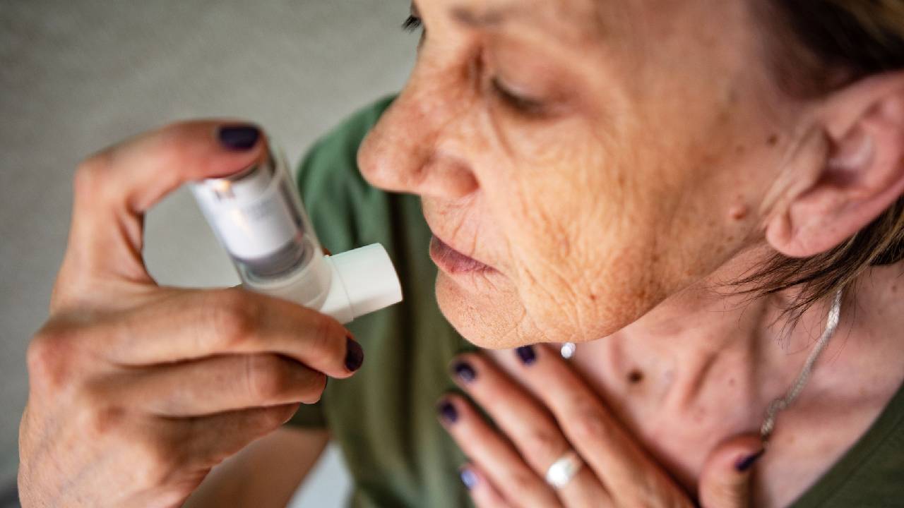 asthma-woman-inhaler-summary